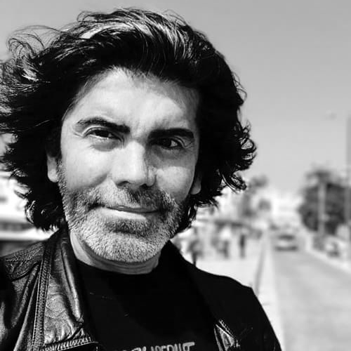 Elio Leturia's black and white headshot